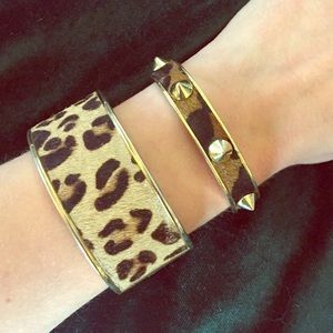 Pair of C.Wonder calf hair cuff bracelets.